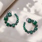 Green crest earrings